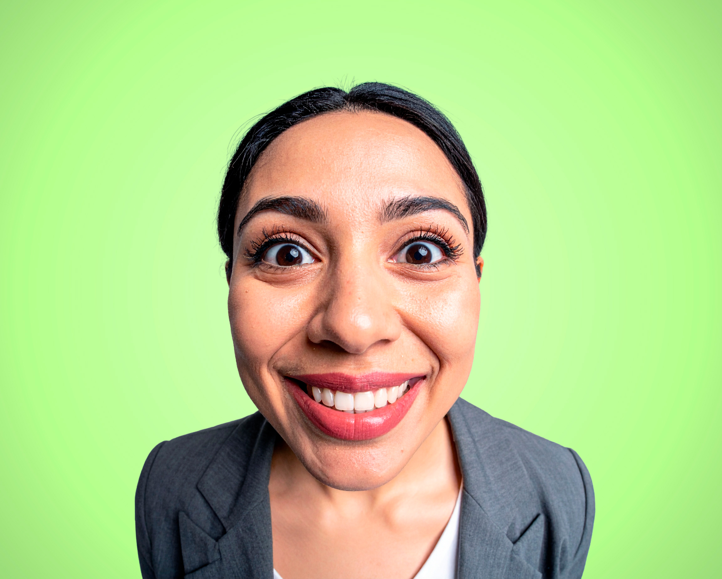 Woman on green background in pitchd brand style photography.